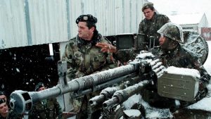 Yugoslav Army commander Nebojsa Pavkovic (left) listens to a soldier’s report near Gjilan/Gnjilane in Kosovo during the war in February 1999. (Photo: EPA/File)